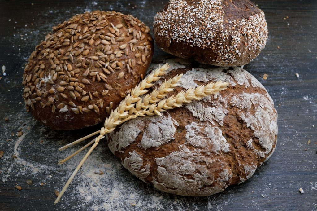 cereal grains and three breads for freshly baked bread an article fo erling.yoga