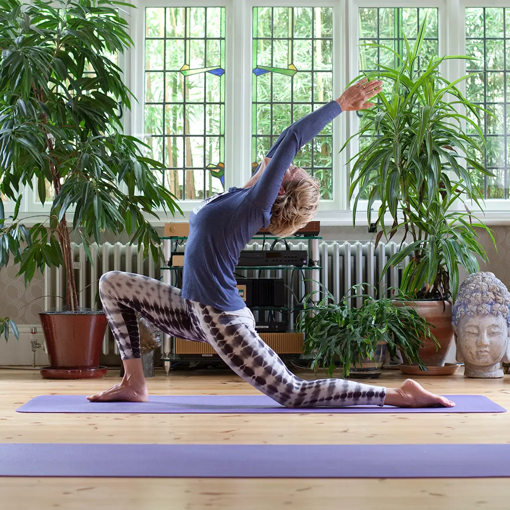 elaine in a back bend for an article on yoga poses